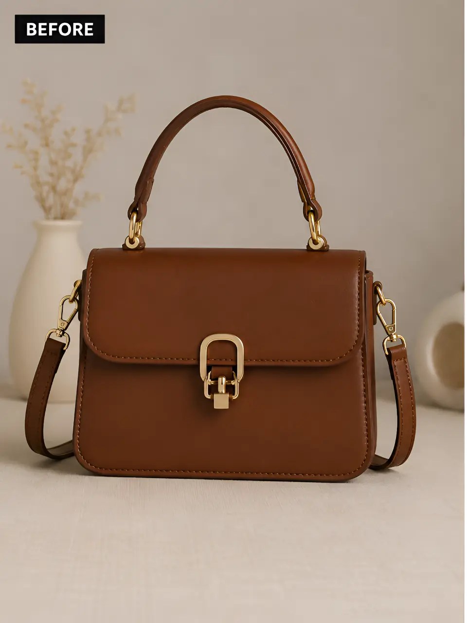 Brown leather handbag isolated on a pure white background — original
